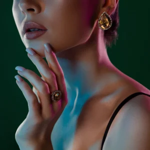 607-woman_wearing_coloured_stone_earrings-min